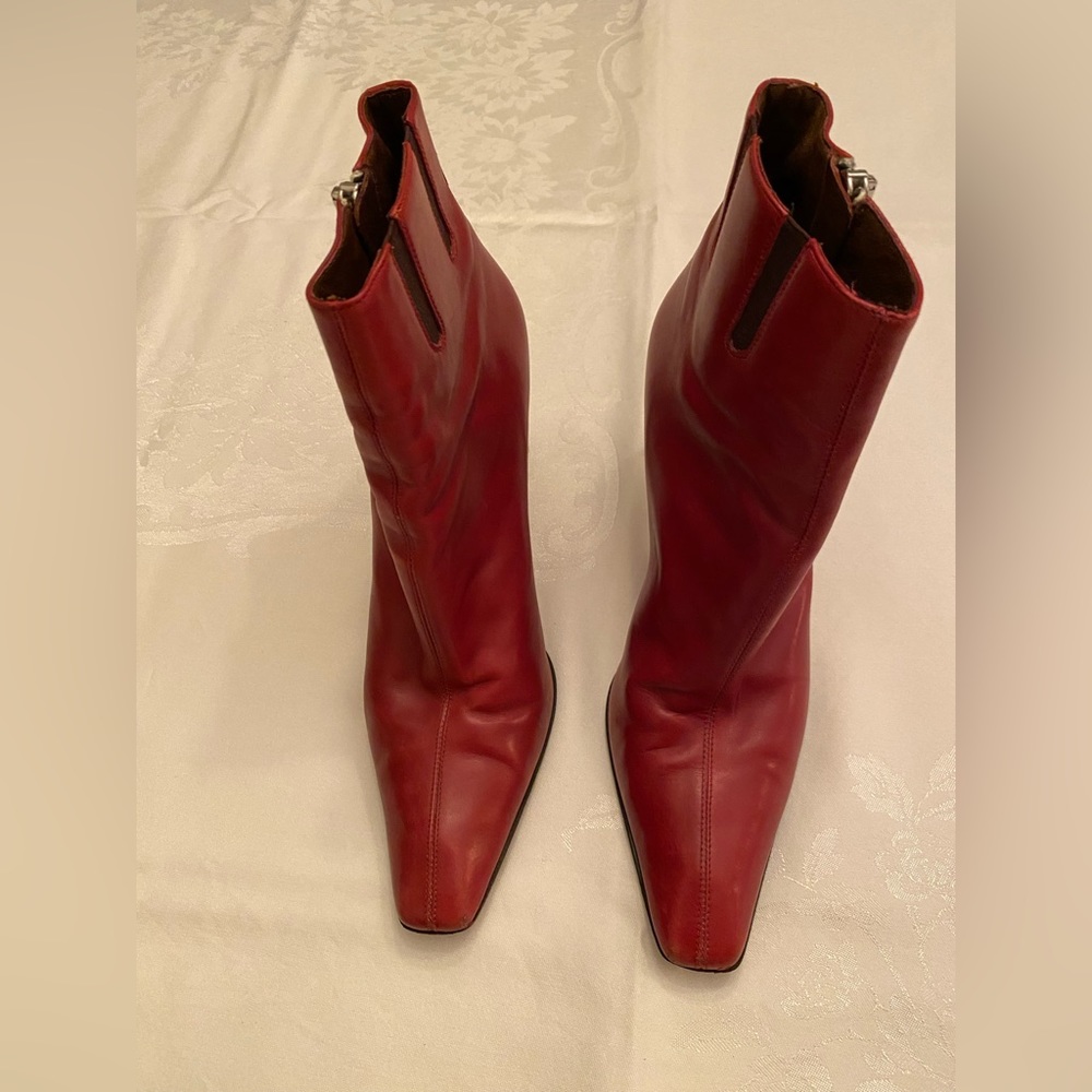 Donald J. Pliner women’s red leather boots.